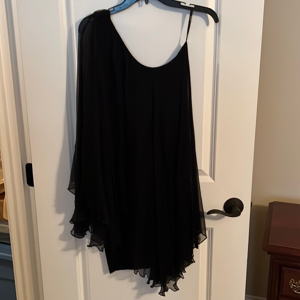 Little black dress. One size fits all. Spandex with Nylon overlay.